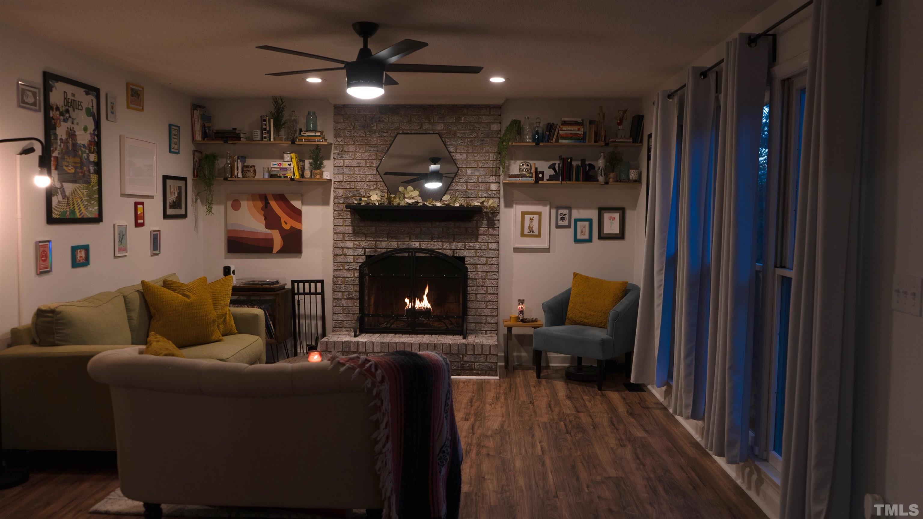 7921 Mandrel Way Raleigh, NC 27616 - Photo 12 of 32 a living room with furniture and a fireplace