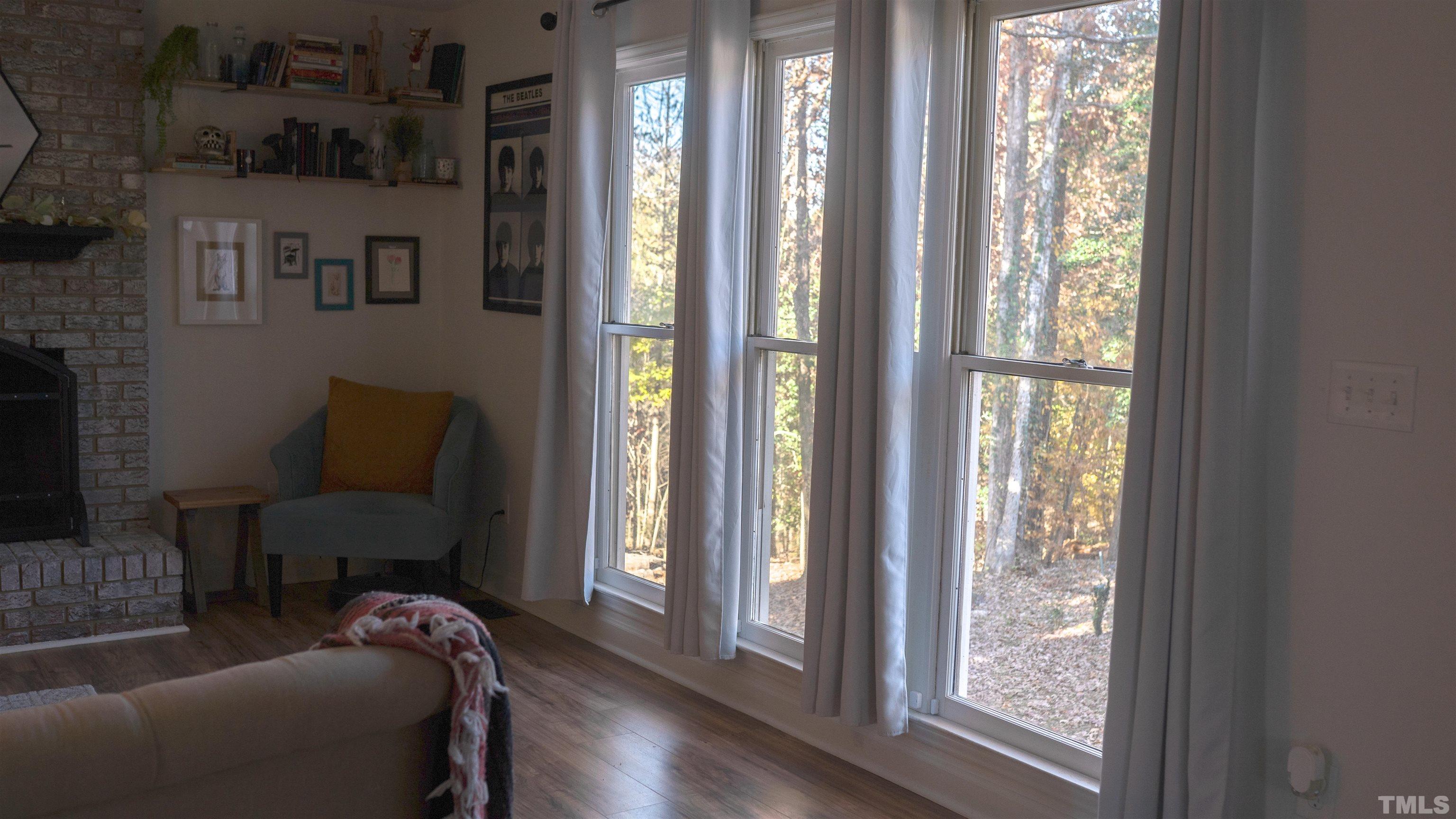 7921 Mandrel Way Raleigh, NC 27616 - Photo 14 of 32 a living room with furniture and a window