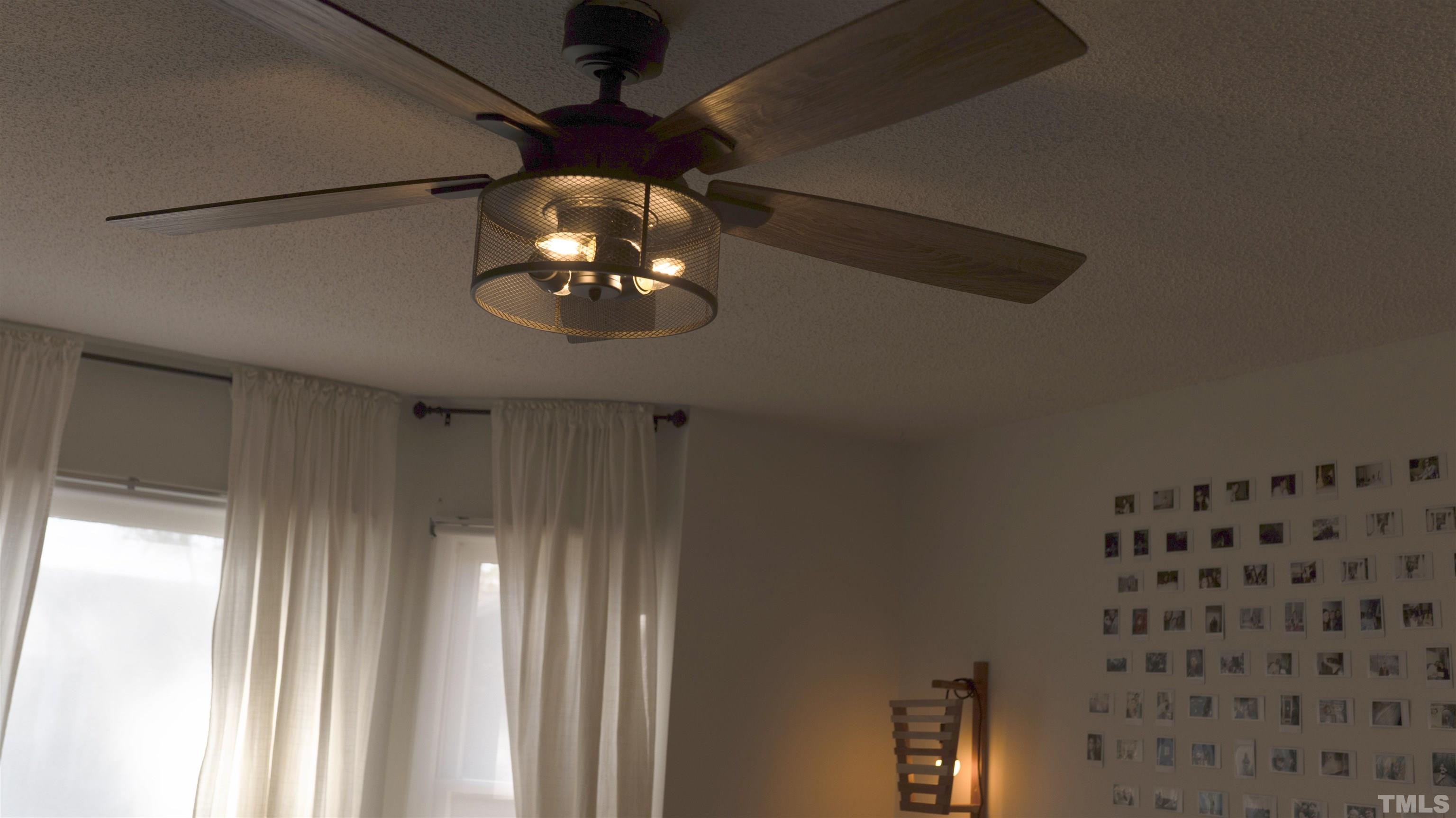 7921 Mandrel Way Raleigh, NC 27616 - Photo 20 of 32 a view of a chandelier fan and wooden floor