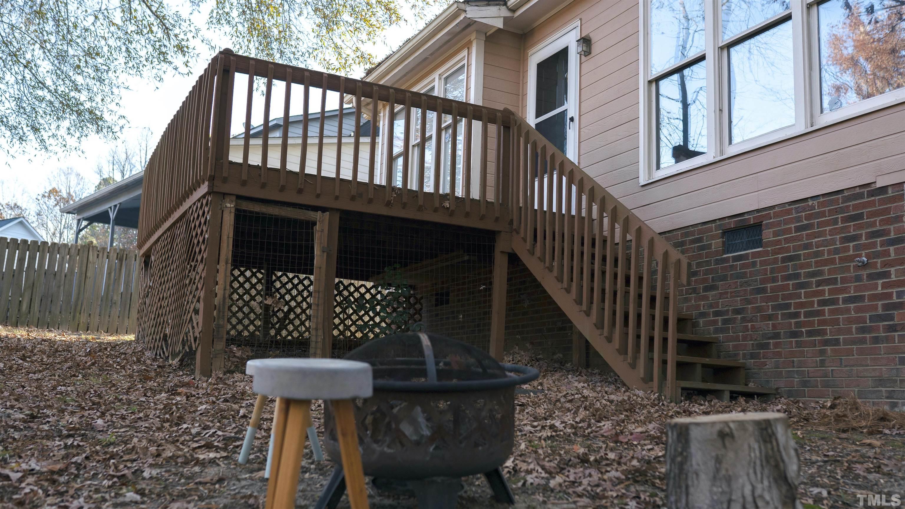 7921 Mandrel Way Raleigh, NC 27616 - Photo 29 of 32 a view of a house with a deck