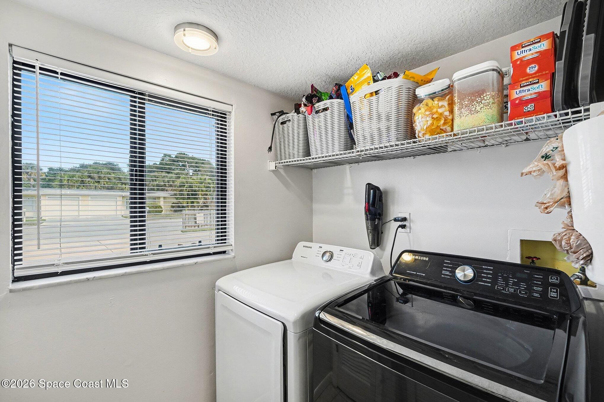 290 North 2nd Street, Unit 3 Cocoa Beach, FL 32931 - Photo 15 of 31 a utility room with dryer and washer
