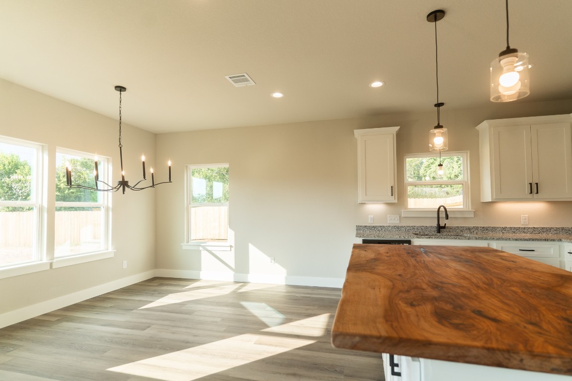 329 String Prairie Way Smithville, TX 78957 - Photo 9 of 33 Kitchen looking into dining area