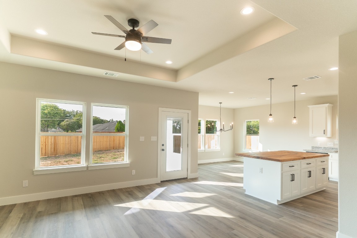 329 String Prairie Way Smithville, TX 78957 - Photo 10 of 33 Looking into Kitchen from Family Room
