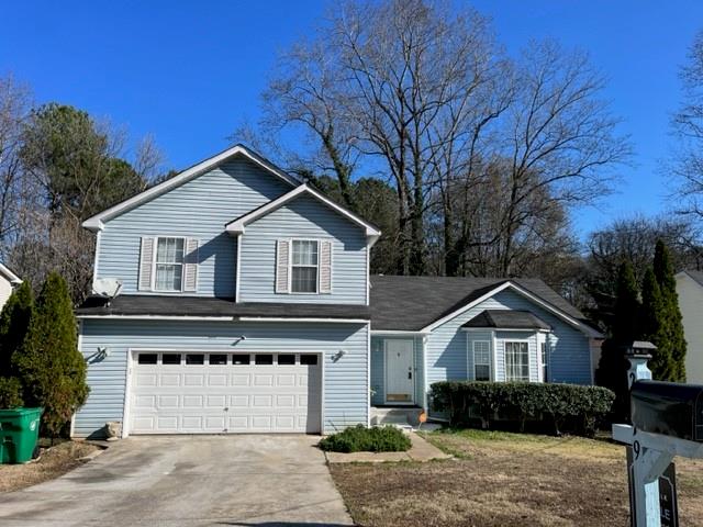 2119 Shoals Way Decatur, GA 30034 - Photo 1 of 1 a front view of a house with a yard and garage