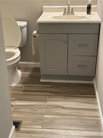 a bathroom with a sink and a toilet