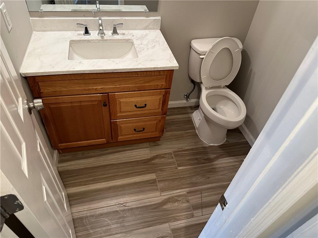 1923 Cheatham Woods Drive Southwest Marietta, GA 30008 - Photo 9 of 20 a bathroom with a sink and a mirror