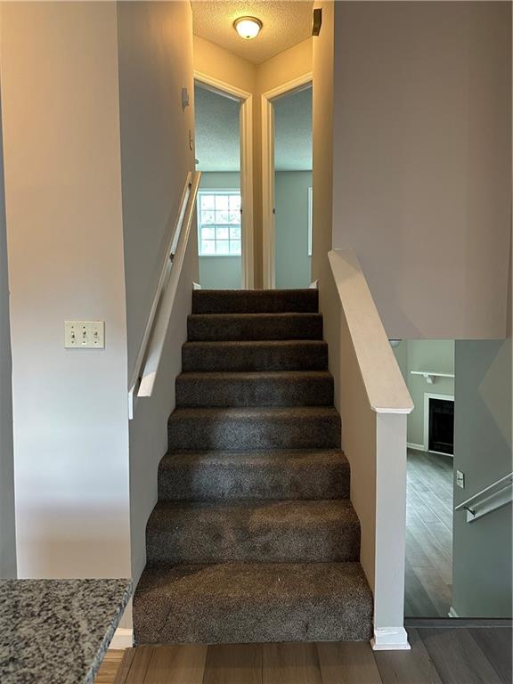 1923 Cheatham Woods Drive Southwest Marietta, GA 30008 - Photo 10 of 20 a view of entryway and hall with wooden floor