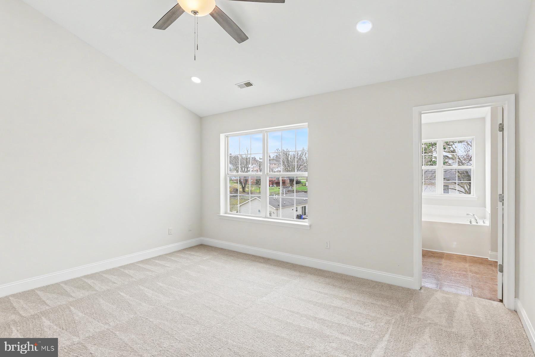 353 West Chestnut Street, Unit 16 Dallastown, PA 17313 - Photo 19 of 27 a view of an empty room with a window