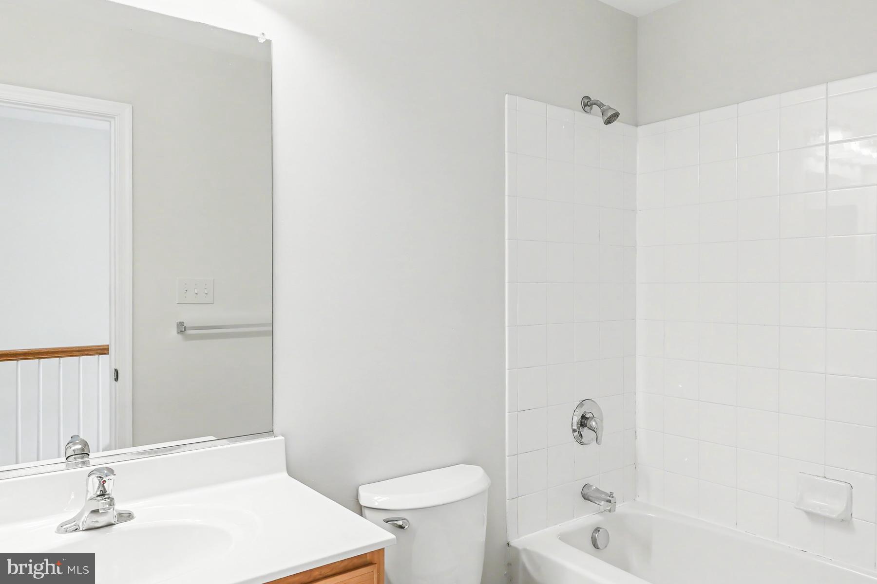 353 West Chestnut Street, Unit 16 Dallastown, PA 17313 - Photo 23 of 27 a bathroom with a sink and a toilet