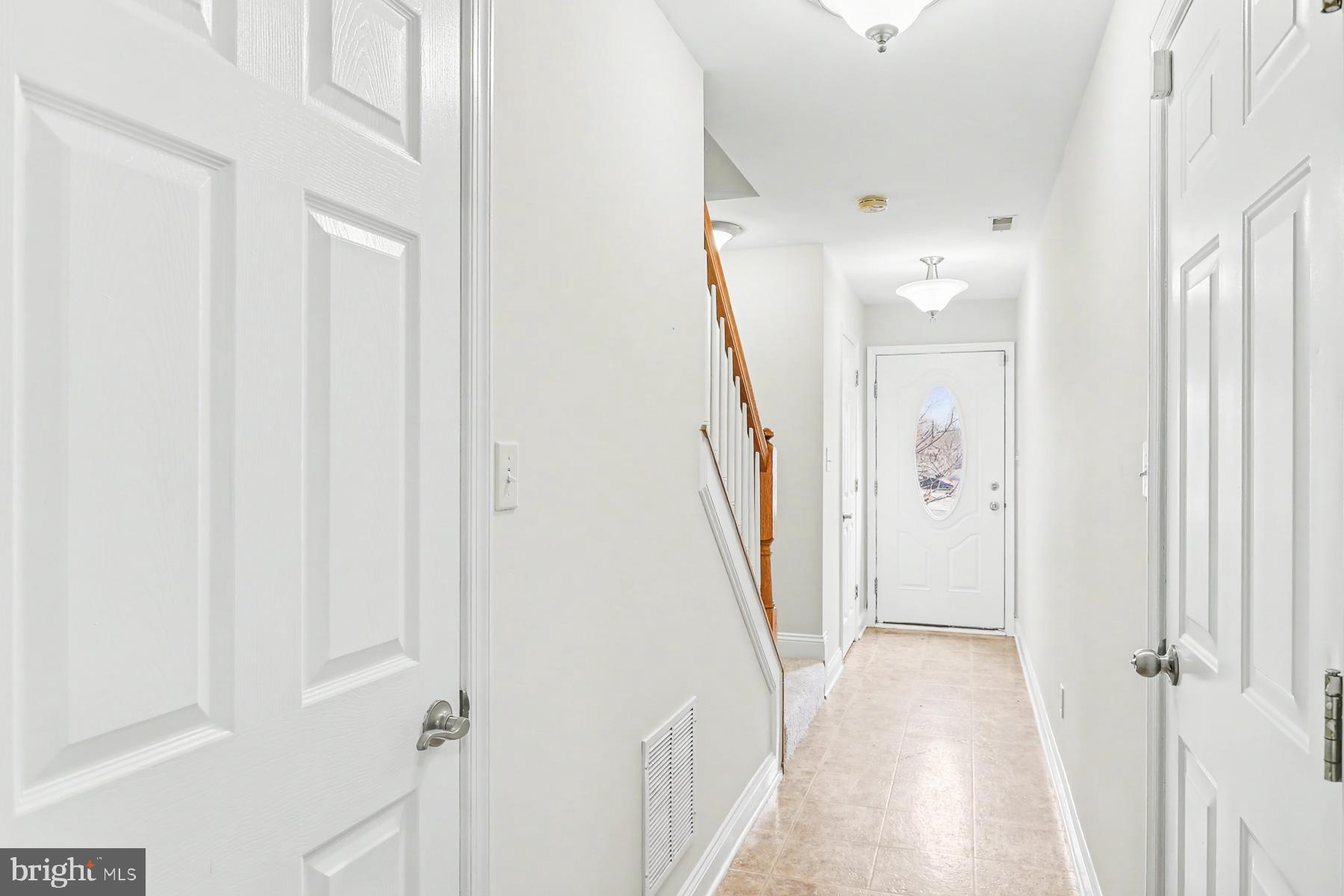 353 West Chestnut Street, Unit 16 Dallastown, PA 17313 - Photo 5 of 27 a view of a hallway with a white walls