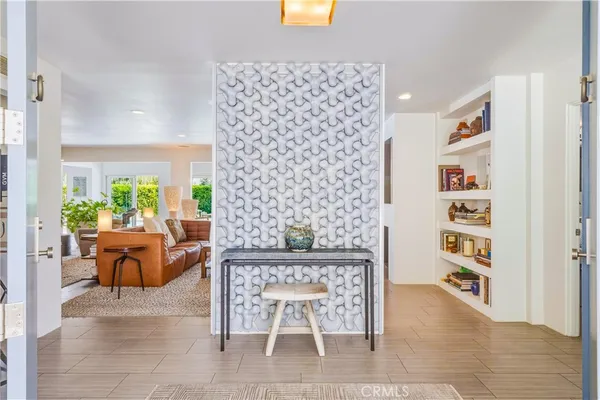 a living room with furniture and a table