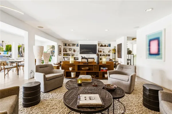 a kitchen with stainless steel appliances granite countertop a stove and a refrigerator