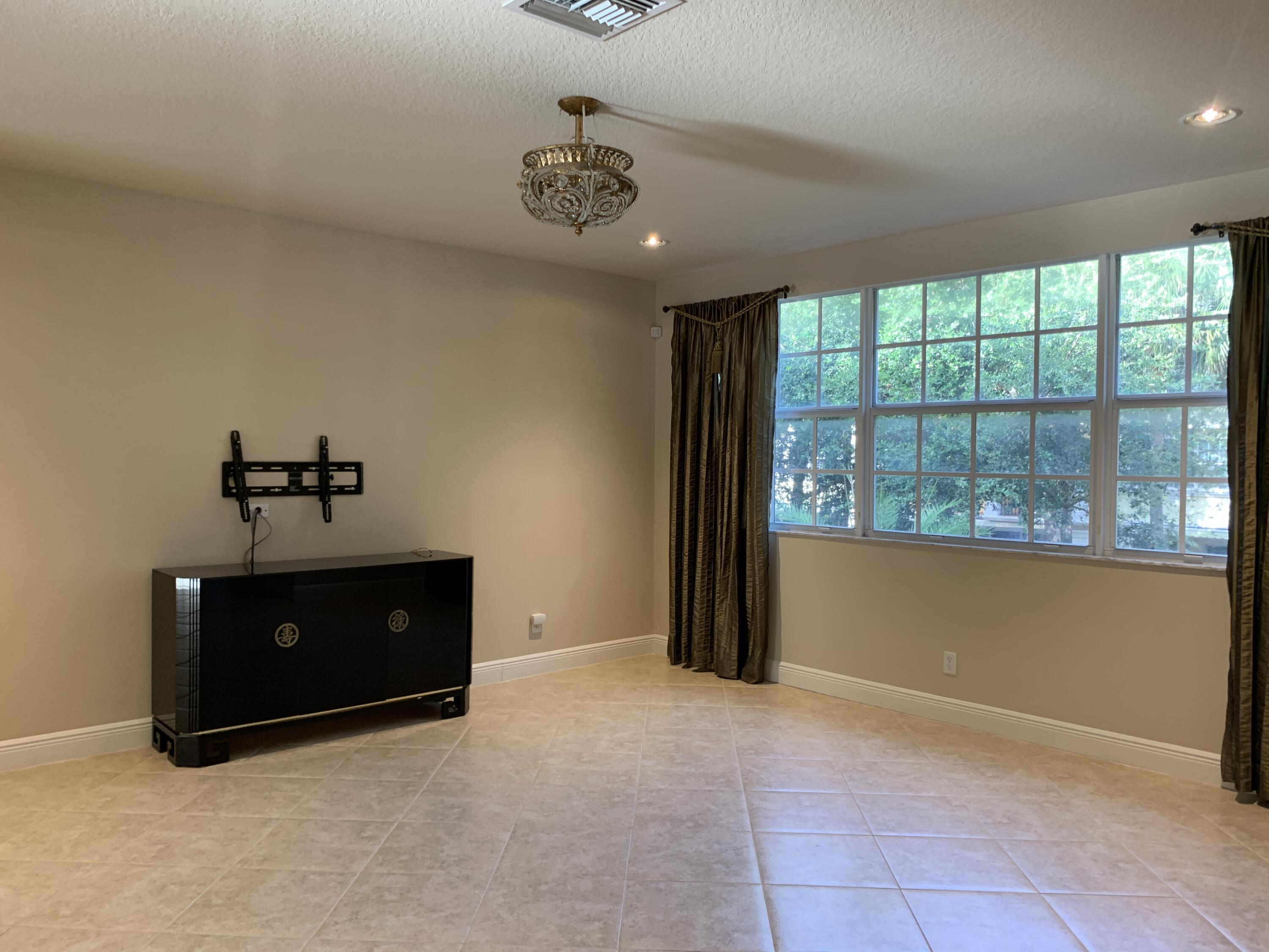 5620 Northeast Trieste Terrace Boca Raton, FL 33487 - Photo 39 of 41 Living Room no furniture