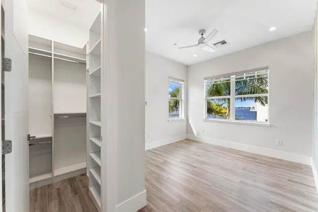 a front view of a building with garden