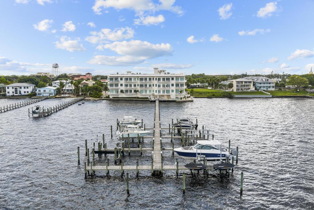 53 Southeast Seminole Street, Unit A Stuart, FL 34994 - Photo 5 of 75 a view of a terrace with sitting area