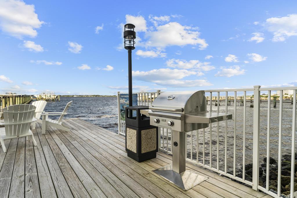 53 Southeast Seminole Street, Unit A Stuart, FL 34994 - Photo 67 of 75 a view of a balcony with wooden floor