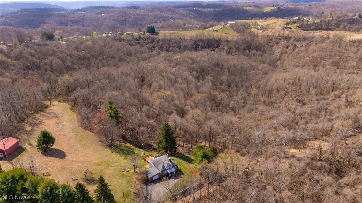 56260 Davis Road Bellaire, OH 43906 - Photo 18 of 44 Drone / aerial view with a wooded view and a rural view