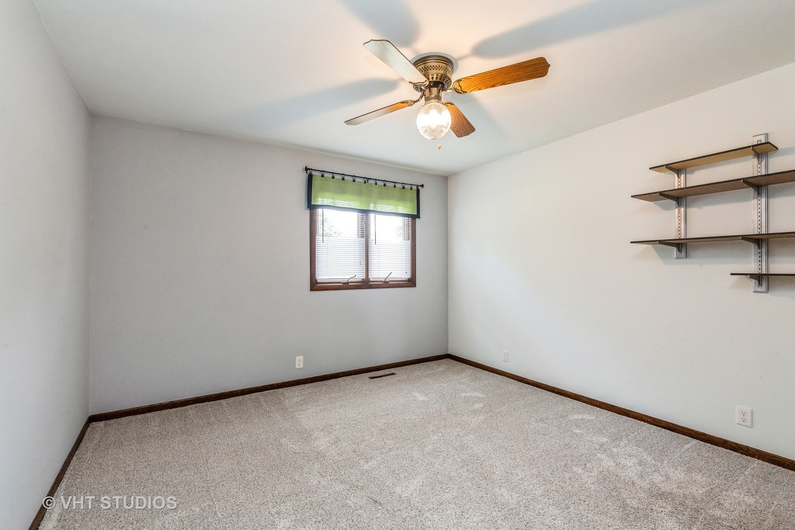 41W723 Lenz Road Elgin, IL 60124 - Photo 14 of 41 an empty room with windows and fan