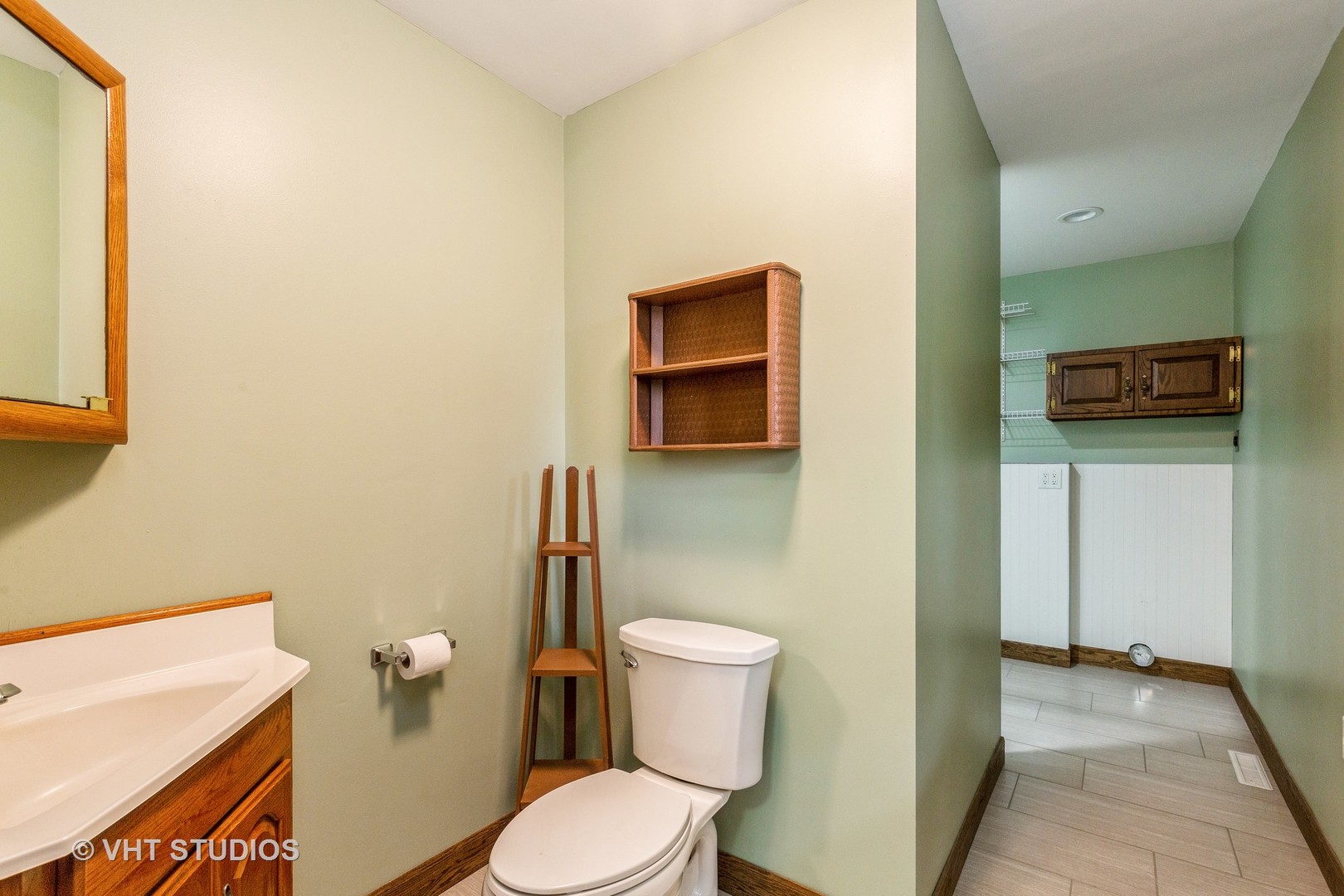 41W723 Lenz Road Elgin, IL 60124 - Photo 23 of 41 a white toilet sitting next to a shower curtain