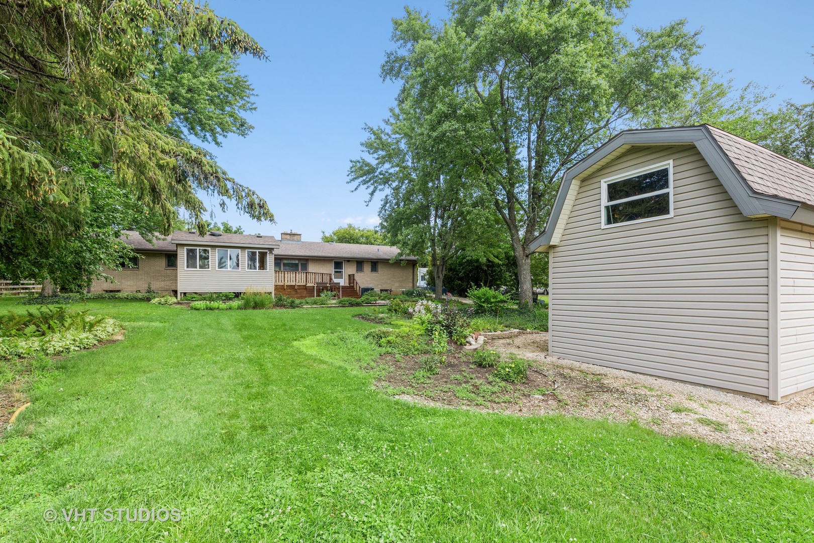 41W723 Lenz Road Elgin, IL 60124 - Photo 33 of 41 a view of a house with backyard and sitting area