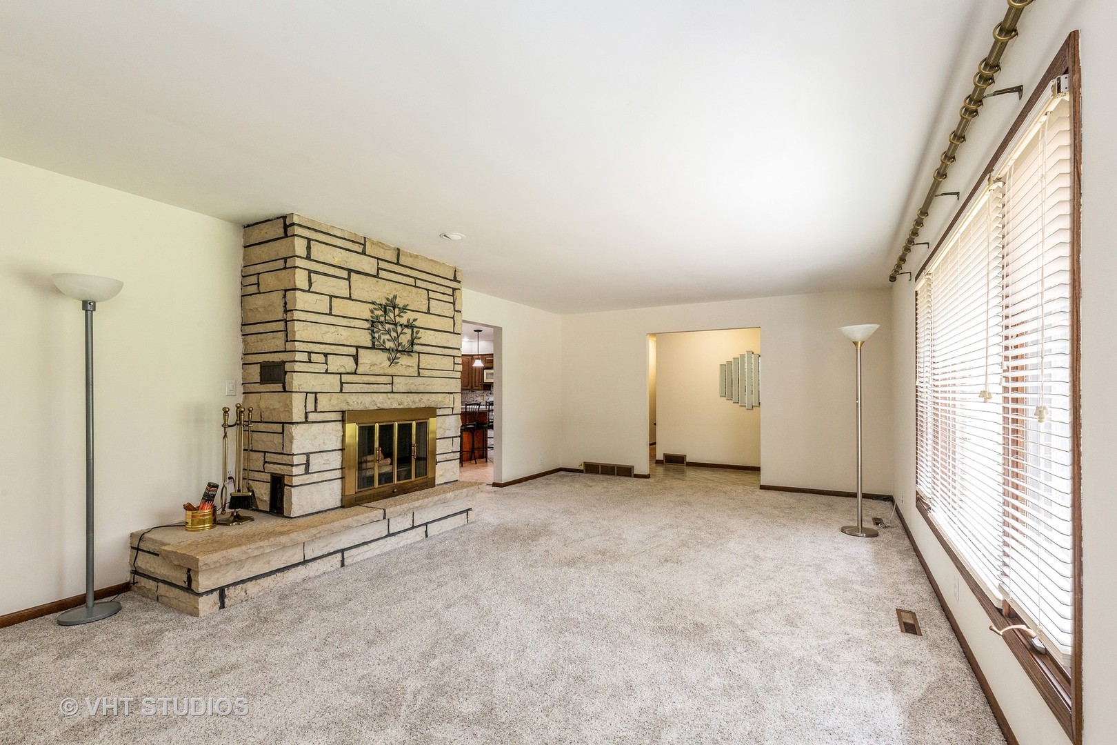 41W723 Lenz Road Elgin, IL 60124 - Photo 4 of 41 an empty room with fireplace and windows