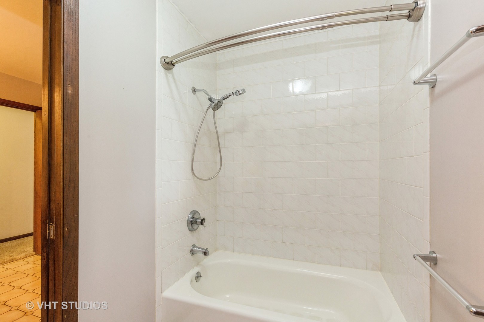 41W723 Lenz Road Elgin, IL 60124 - Photo 10 of 41 a bathroom with a shower and a bath tub