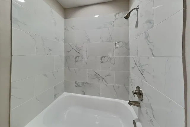 a bathroom with a bathtub