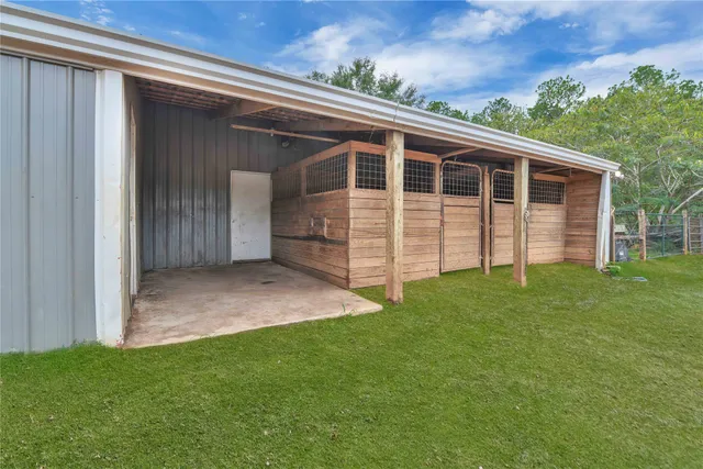 front view of a house with a garden