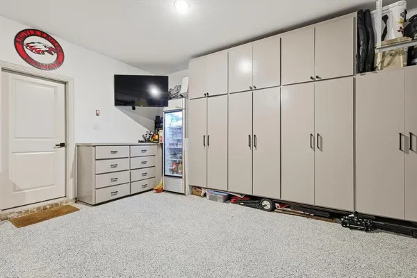 a view of a storage & utility room with closet