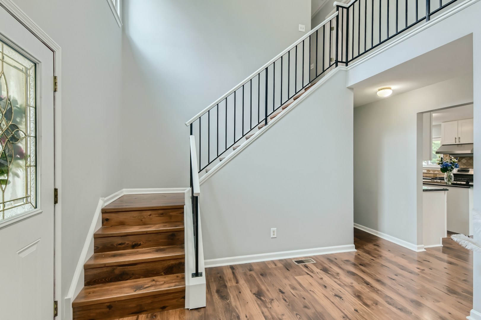 512 Susan Street Romeoville, IL 60446 - Photo 10 of 21 a view of entryway and hall with wooden floor