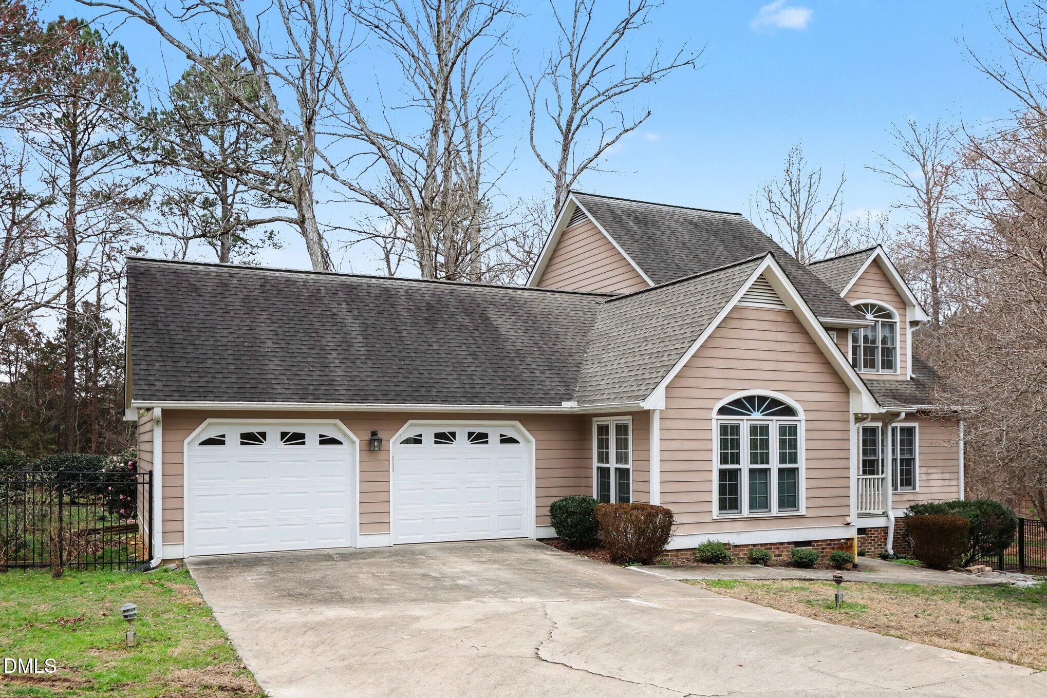 1121 Milton Road Durham, NC 27712 - Photo 24 of 31 a front view of a house with a yard