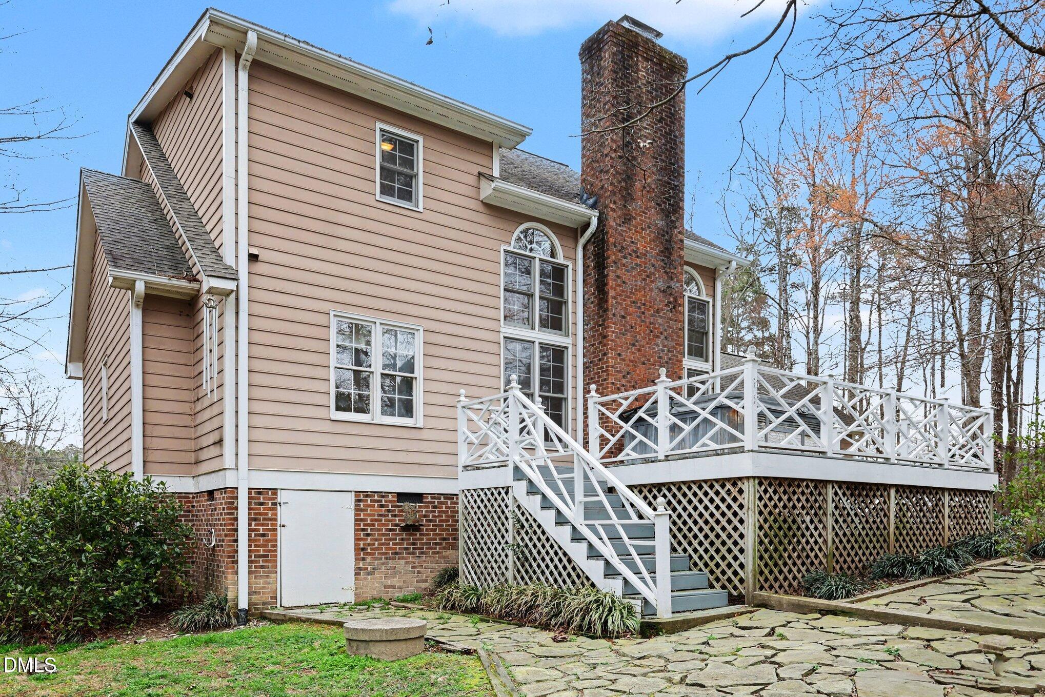 1121 Milton Road Durham, NC 27712 - Photo 26 of 31 a front view of a house with a garden