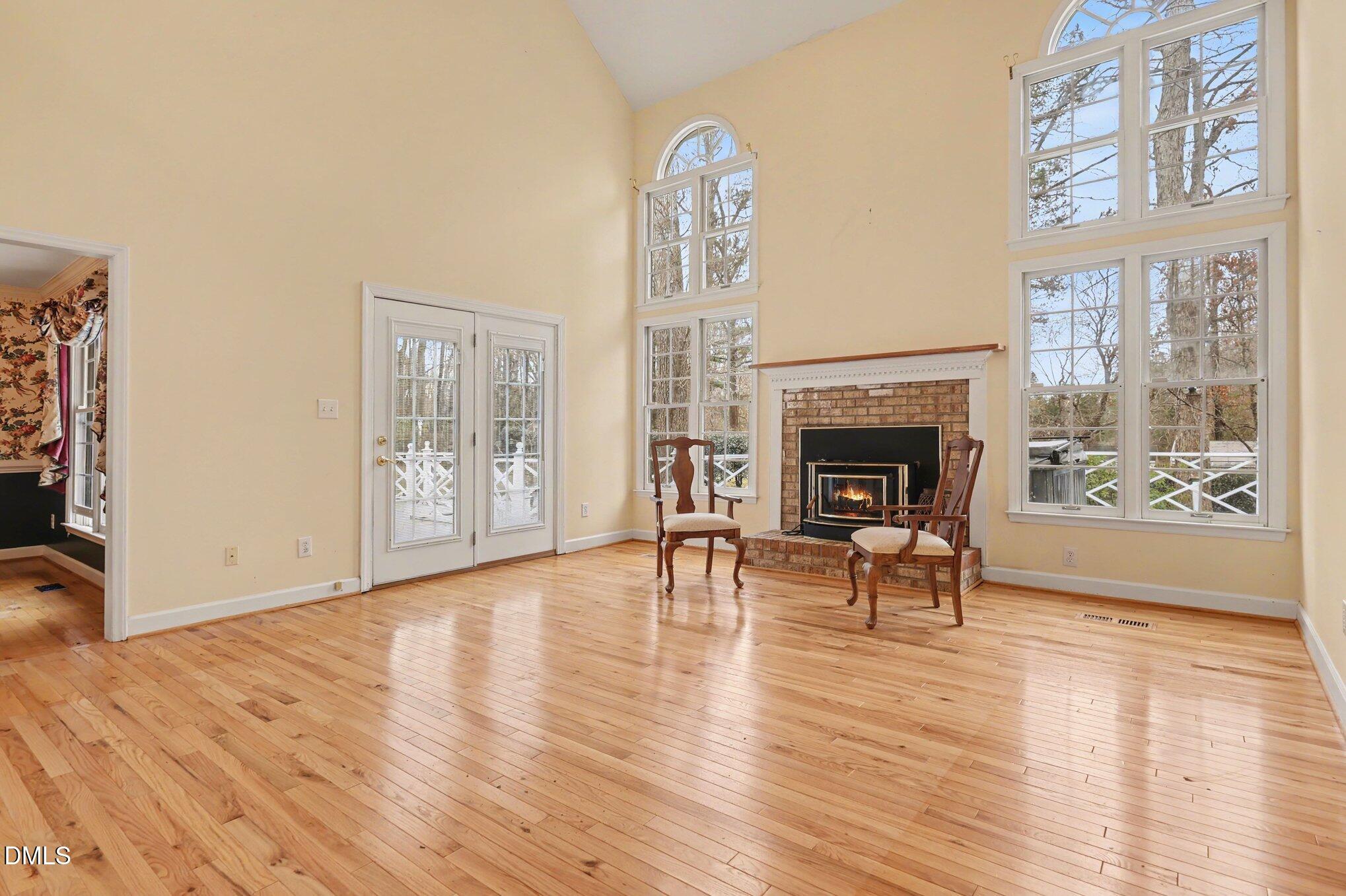 1121 Milton Road Durham, NC 27712 - Photo 5 of 31 a living room with furniture and a fireplace