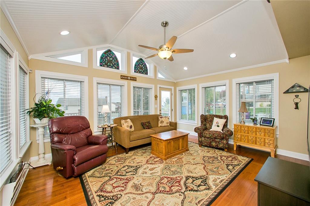 83 Rustic Ridge Drive Pittsburgh, PA 15239 - Photo 12 of 25 4 Season Sun Room with Vaulted Ceiling, Oak Hard Wood Flooring & Lots of Windows for Natural Lighting