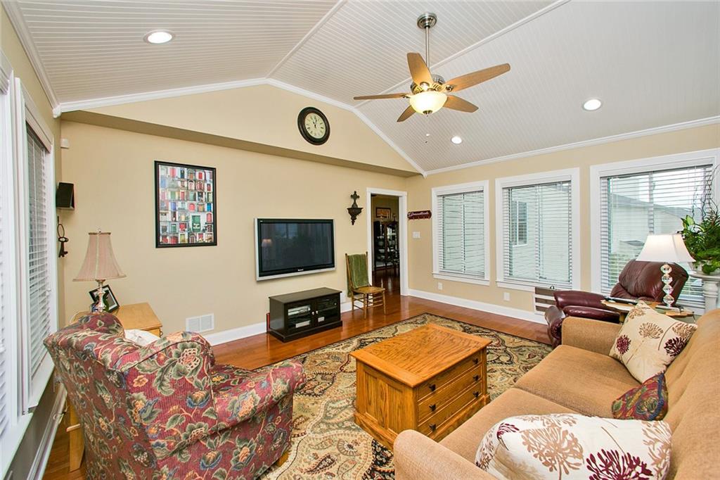 83 Rustic Ridge Drive Pittsburgh, PA 15239 - Photo 13 of 25 View as You Enter the 4 Season Sun Room from the Rear Deck. TV is Included!