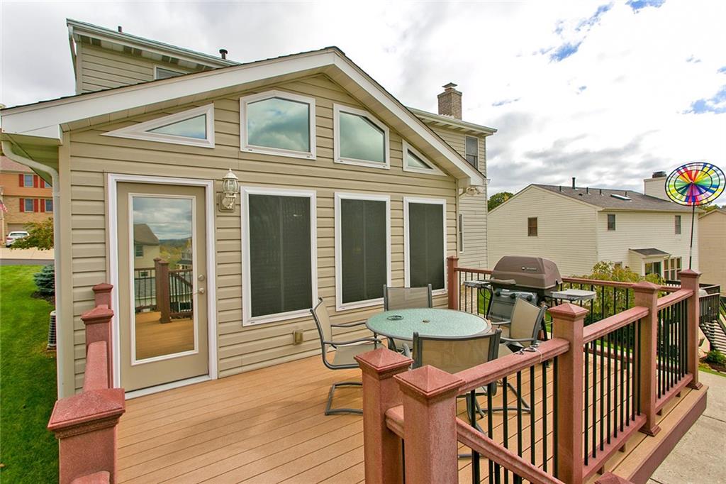 83 Rustic Ridge Drive Pittsburgh, PA 15239 - Photo 15 of 25 Rear Trex Deck Enters into the 4 Season Sun Room