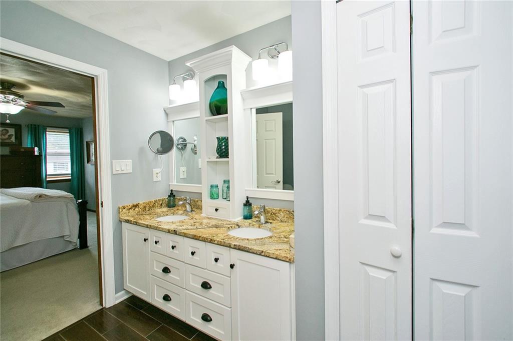 83 Rustic Ridge Drive Pittsburgh, PA 15239 - Photo 17 of 25 Full Bath Room with Double Sink w/ Granite Counter Top Off of the Master Bed Room