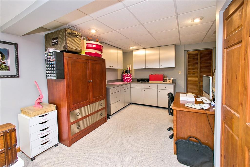 83 Rustic Ridge Drive Pittsburgh, PA 15239 - Photo 24 of 25 Game Room Has Cabinets and Counter Top Space - a Great Work Area for the Hobbyist or Crafting