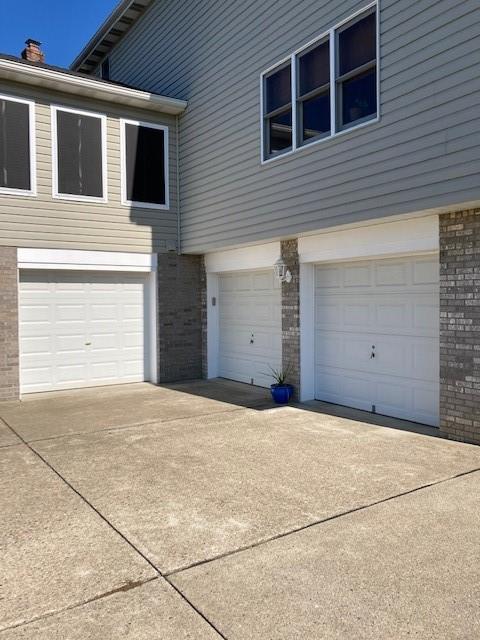83 Rustic Ridge Drive Pittsburgh, PA 15239 - Photo 25 of 25 A two car integral garage PLUS a 3rd attached garage for that extra vehicle, extra storage, or a workshop.