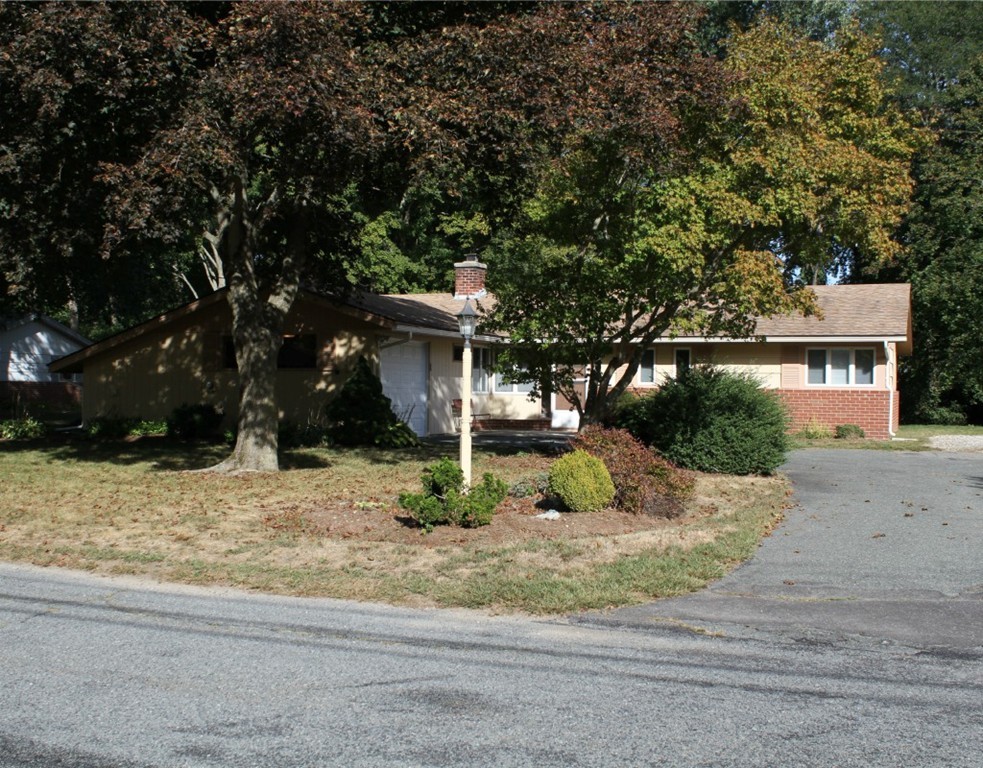 15 Temi Road Framingham, MA 01701 - Photo 1 of 13 a view of a white house with a tree