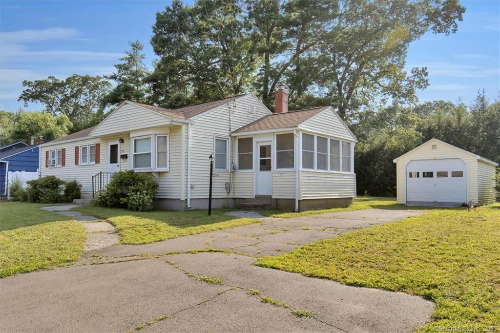 33 Ellis Road Enfield, CT 06082 - Photo 1 of 1 a front view of a house with a yard