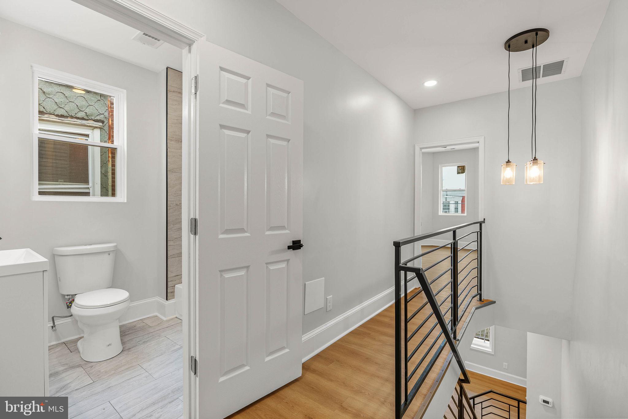 5737 Springfield Avenue Philadelphia, PA 19143 - Photo 20 of 31 a bathroom with a toilet