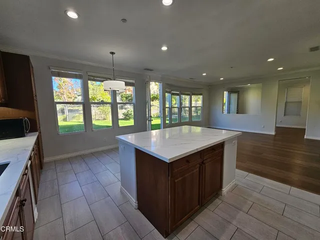 a kitchen with a counter top space and a sink