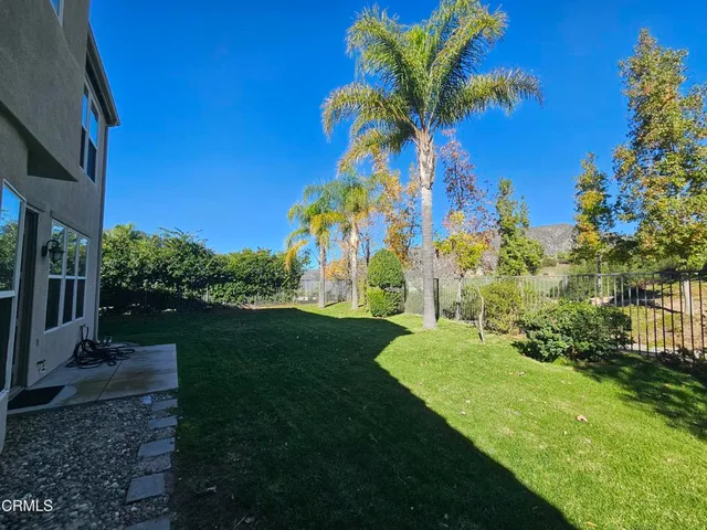 a view of a park with a houses