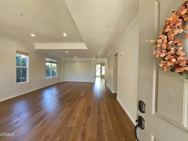 a view of entryway with wooden floor