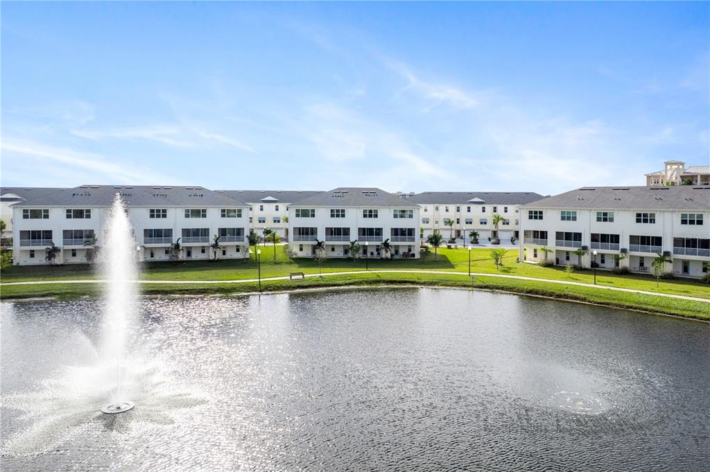 9957 Key Haven Road Seminole, FL 33777 - Photo 22 of 27 a view of swimming pool with a yard in the background