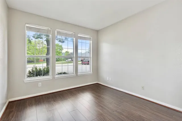 an empty room with windows