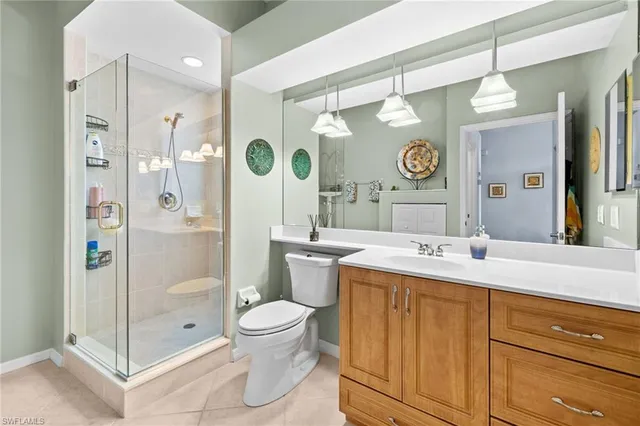 a view of a livingroom with workspace and a couch