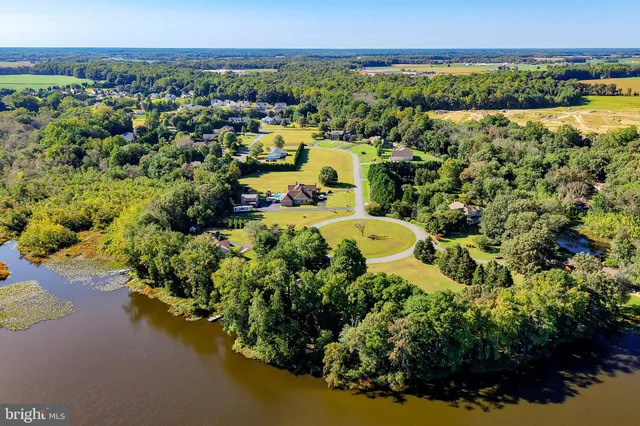 a view of a swimming pool with a chairs