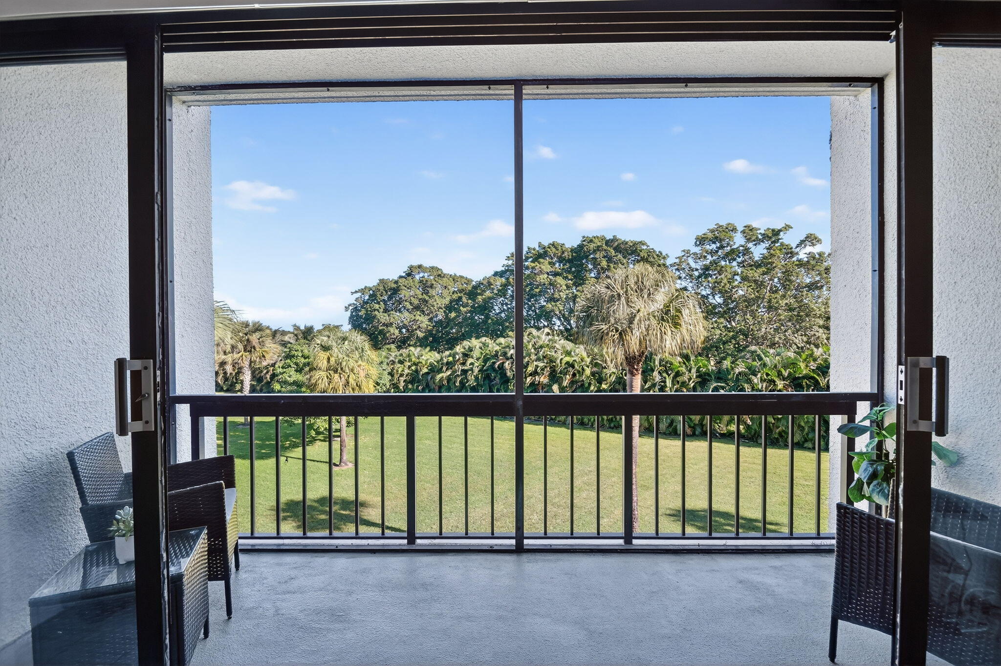 2500 Presidential Way, Unit 302 West Palm Beach, FL 33401 - Photo 19 of 52 a view of a balcony with a swing